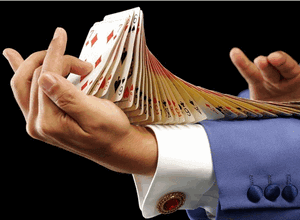 man's arm with card trick