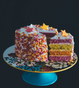 decorated cake on a pedestal platter