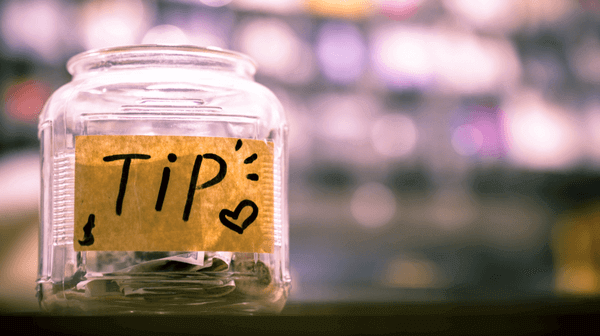 a picture of a jar with a label stating "Tips"