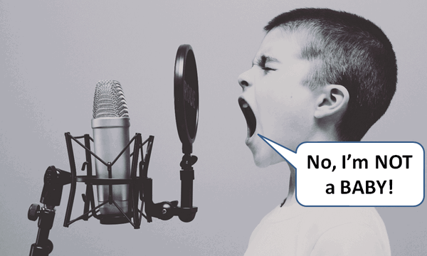 child screaming into podcast mic saying "No, I'm not a BABY!"