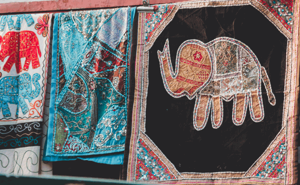 baby's quilts, one which depicts an elephant
