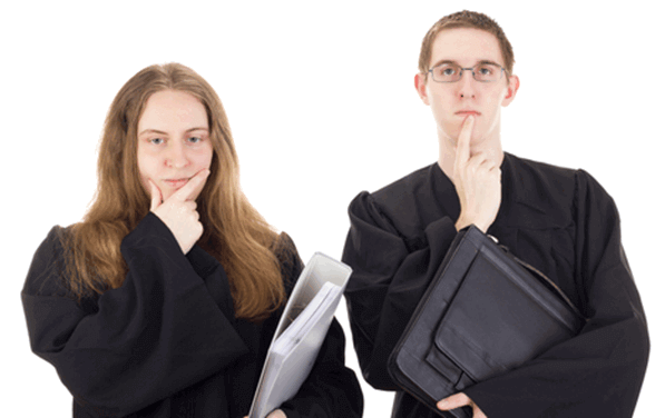 female and male students intently listening